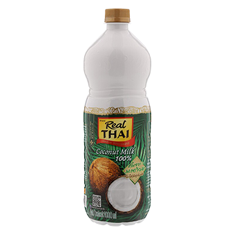 Coconut milk in a can from Real Thai, rich and creamy Thai grocery product with a smooth white liquid inside