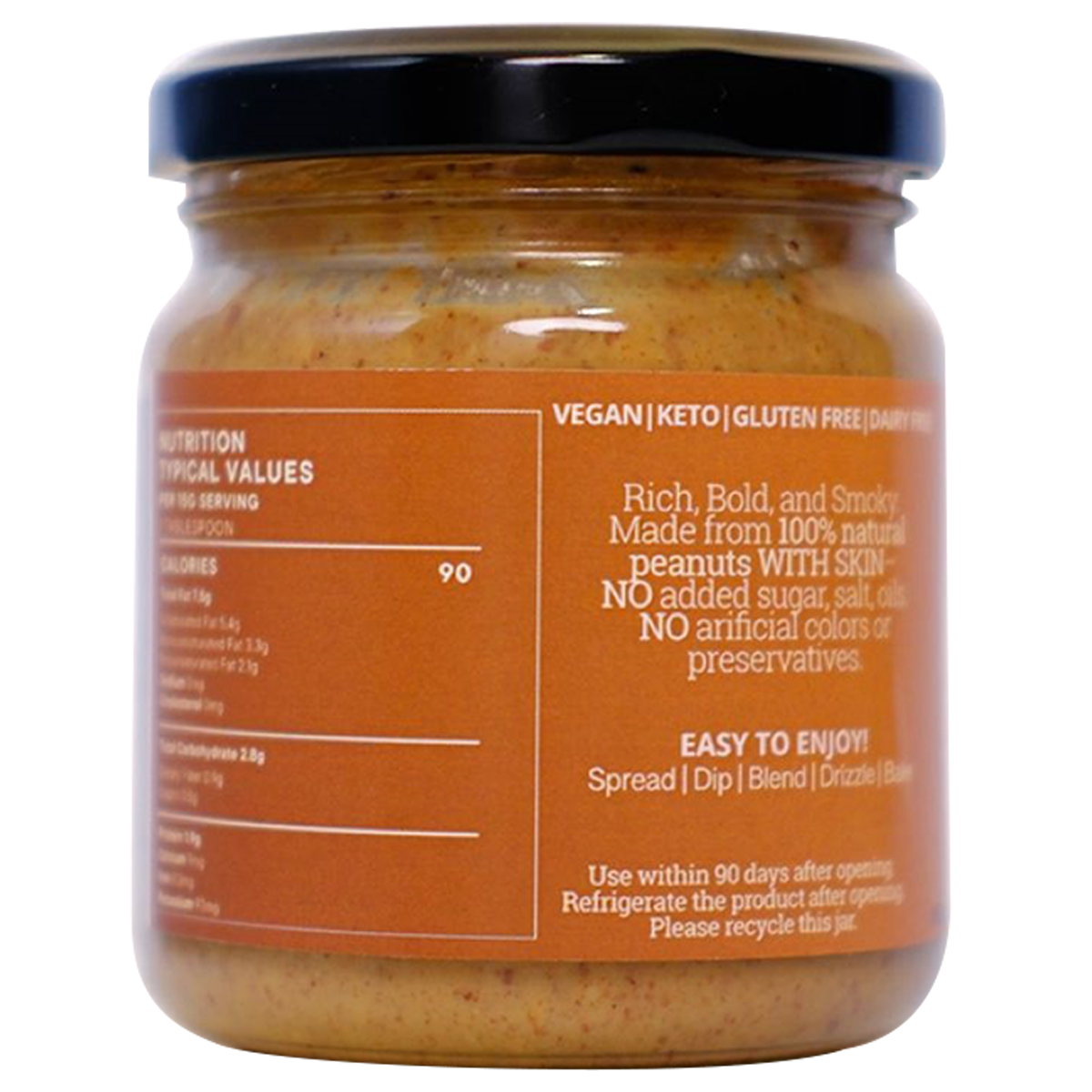 Sunshine Crunchy Dark Peanut Butter jar with a label, showcasing the textured surface of the peanut butter inside.