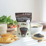 Pure Grain 100% ground roasted black sesame in an 80g package, dry grocery product with black sesame seeds visible in the image.