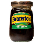 Jar of Branston Original Pickles showing sliced pickles inside a clear glass jar on a grocery shelf.