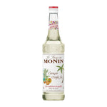 Bottle of MONIN Triple Sec Curacao Syrup 700ml for cocktails and desserts, featuring bright orange flavor and clear packaging.