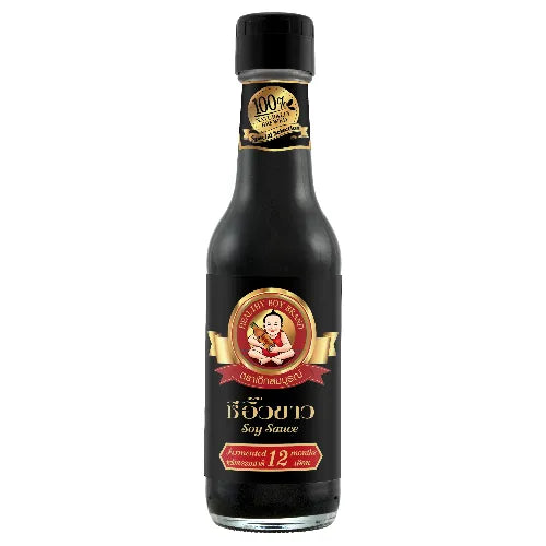 Deksomboon Premium Soy Sauce 250ml bottle, rich dark liquid for cooking, in a clear glass bottle with a label.