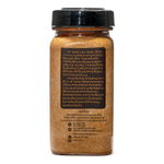 United Cayenne Powder in a clear jar, showing bright red cayenne chili flakes, used as a spicy seasoning in cooking.