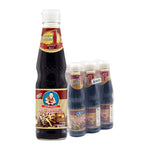 Six bottles of DEK SOM Boon Mushroom Sauce, 300ml each, in clear glass bottles with labels, displayed side by side.