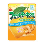 Bourbon Fettuccine Gummy candies with concentrated lemon juice, dry snack confectionery in colorful packaging.