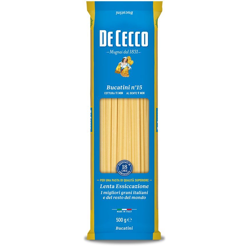 De Cecco Bucatini #15 pasta in a clear bowl, showcasing the short, thick Italian spaghetti with a golden color.