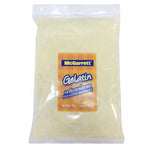 Mcgarrett Gelatine Powder 500g in a clear container, showing the dry, granular gelatine suitable for cooking and baking.