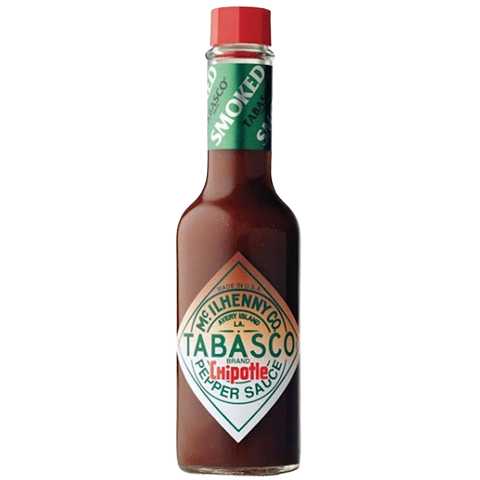 Bottle of Tabasco Chipotle Pepper Sauce showing the label and orange-colored sauce inside the clear glass bottle.
