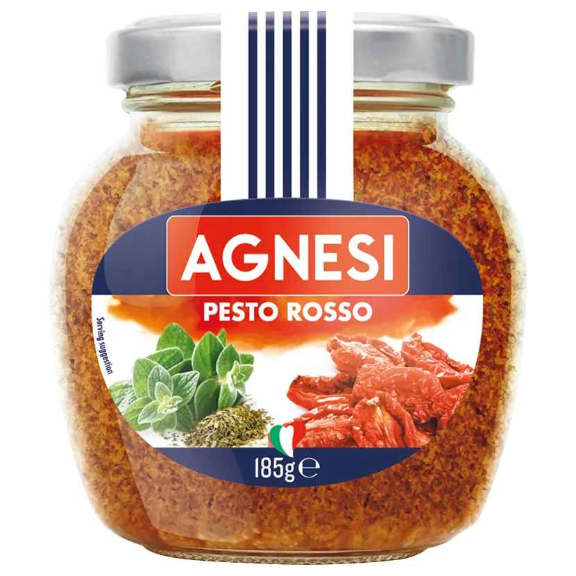 Jar of Agnesi Red Pesto Sauce with basil and tomatoes, showcasing the vibrant red color and fresh ingredients.