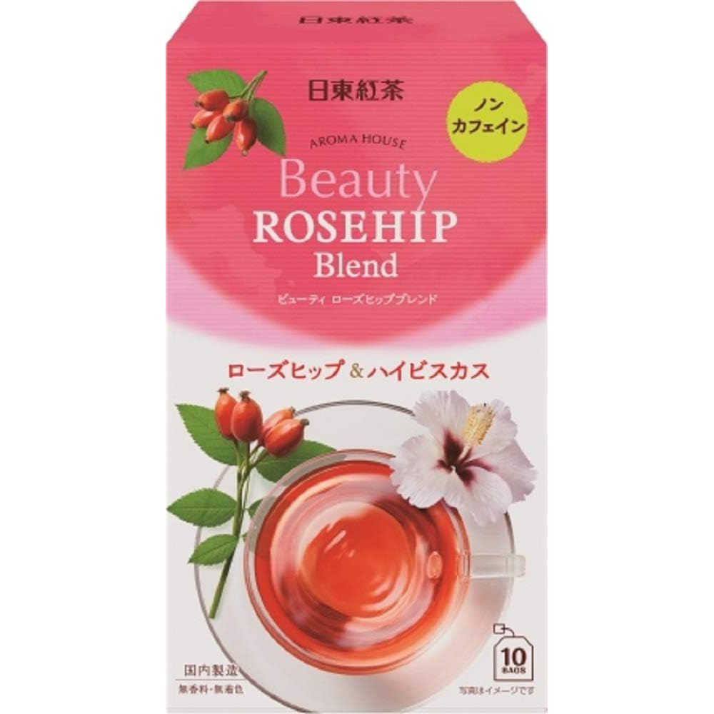 Nittoh Rosehip Blend drink in a clear glass, showcasing vibrant red rosehip infusion with fresh rosehip berries.