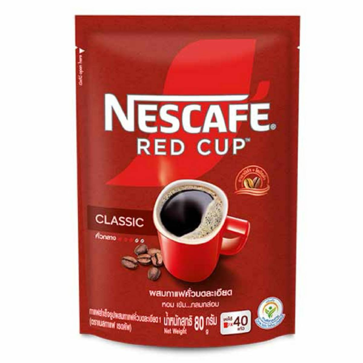Nescafe Red Cup Coffee drink in a clear glass, showcasing its rich, dark coffee color and inviting aroma.