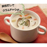 Youki Kaibashira soup stock granules with scallop extract in a clear jar, dry grocery seasoning for flavorful cooking