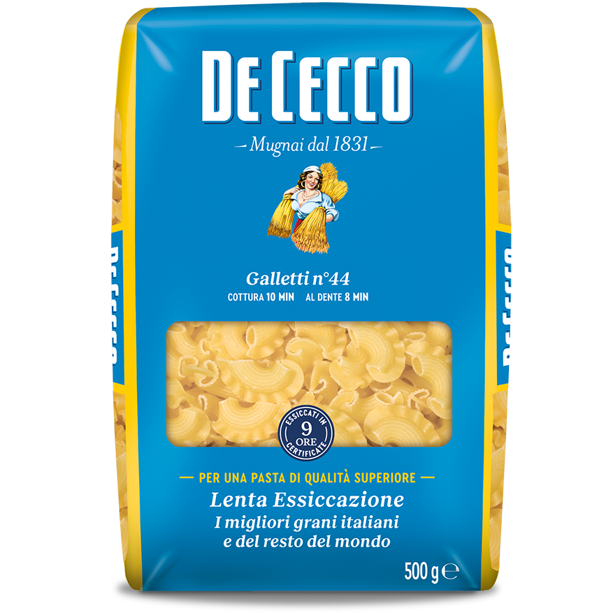 De Cecco Galletti #44 pasta in a clear bowl, showcasing the small, crunchy Italian pasta shape with a golden color.
