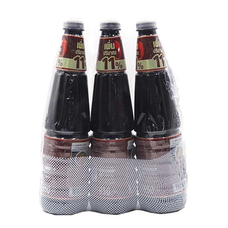 NGUAN CHIANG Sweet Dark Soy Sauce 950g bottles, traditional dry grocery condiment, displayed in a row.