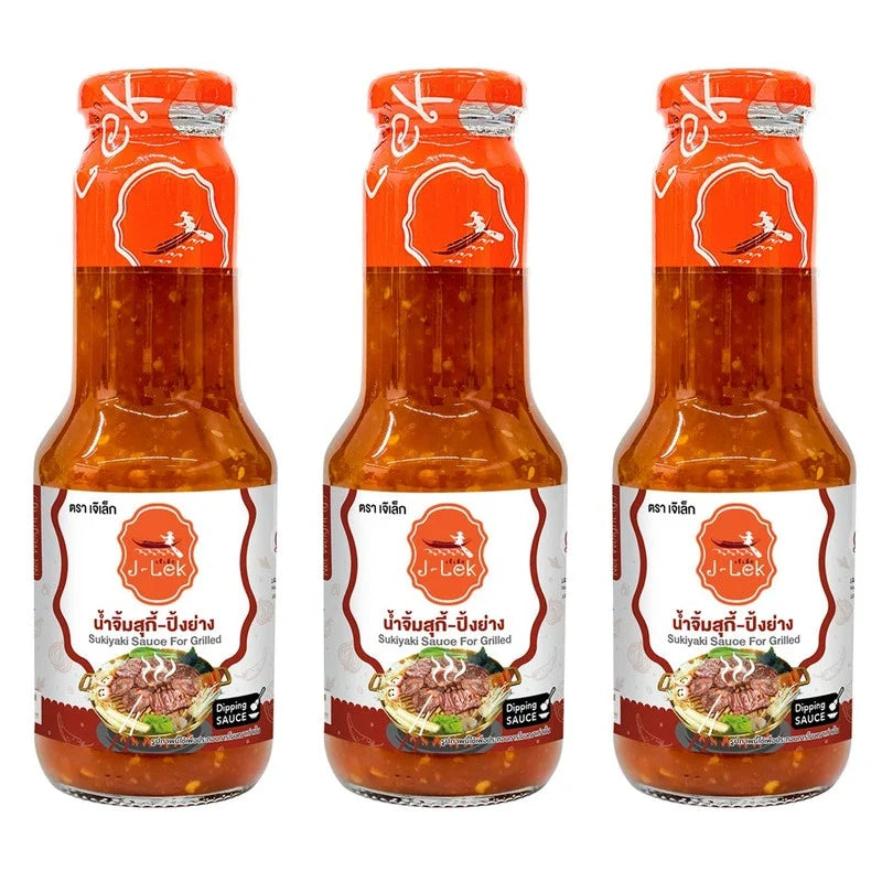 J-LEK Sukiyaki Grilled Sauce bottles, 350g, in clear glass with label, displayed on a kitchen countertop.
