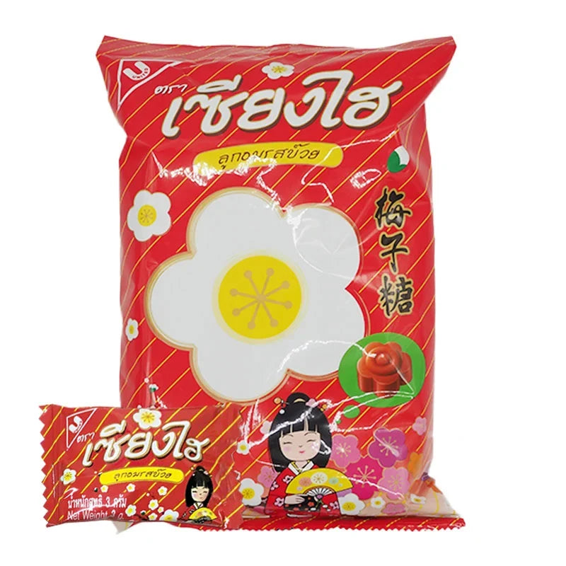 Sanghai Candy Plum flavored dry grocery snack by SANGHAI, showing colorful plum-flavored confectionery pieces in a clear bowl.