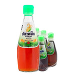 Six 300ml bottles of Squid Brand Fish Sauce in clear glass containers, showcasing the dark liquid inside.