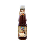 Deksomboon Oyster Sauce Thick 350g bottle, classic dry grocery condiment with rich oyster flavor and glossy dark appearance.