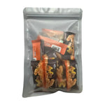 Nezline Toffee Caramel Nut Crisp snack in a clear wrapper, showing golden toffee, caramel, and crunchy nut pieces.