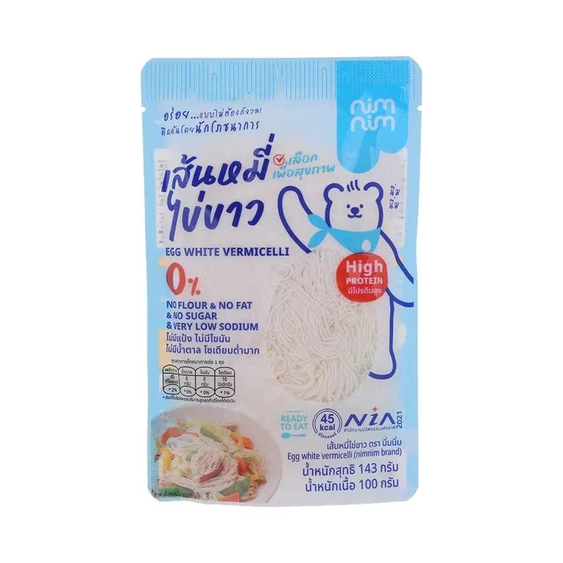 Nimnim Egg White Noodles by NIMNIM in a dry grocery package, showcasing the noodle strands and packaging design.