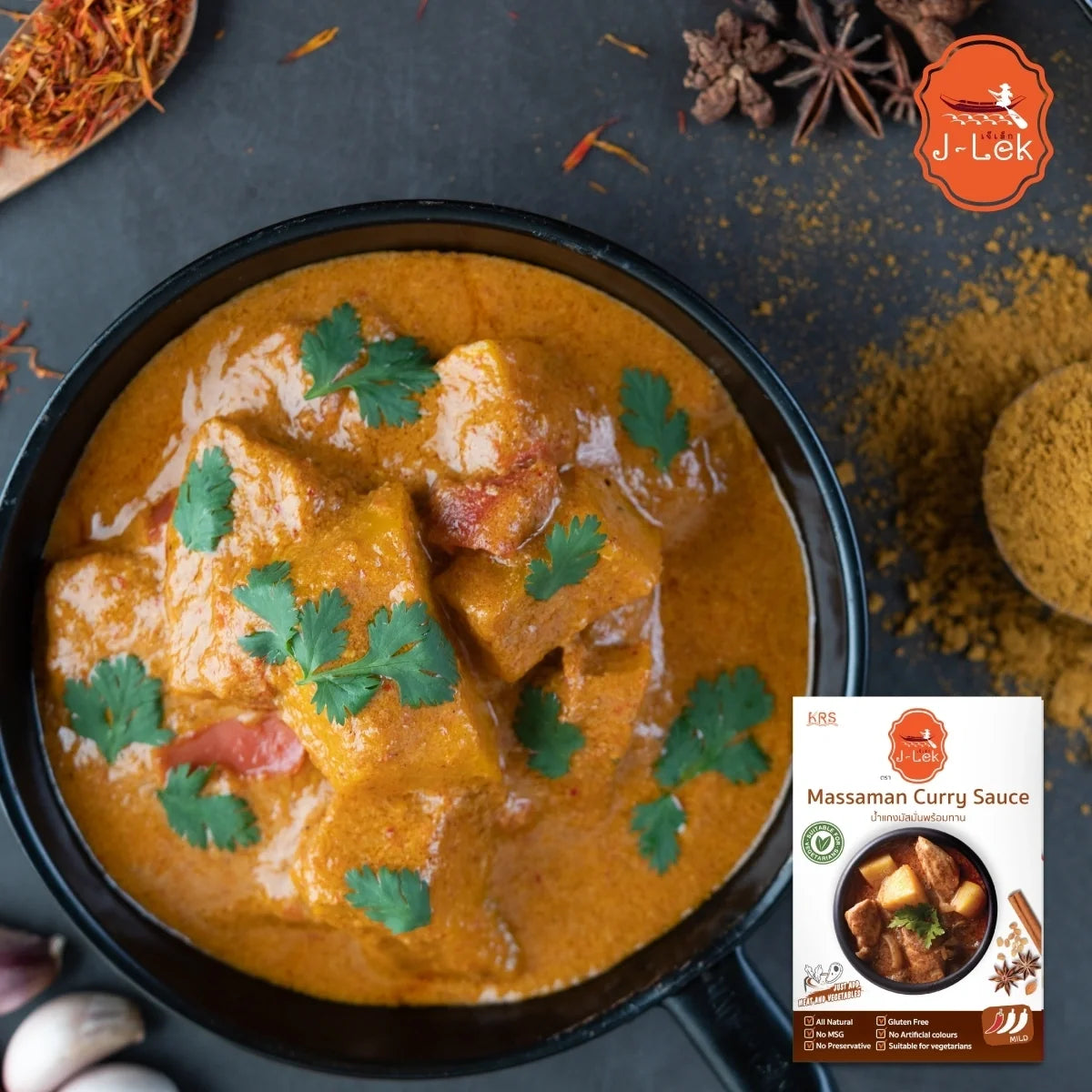 J-lek Massaman Curry Paste 250g in a jar, showing the label and vibrant curry paste inside, ideal for Thai cooking.