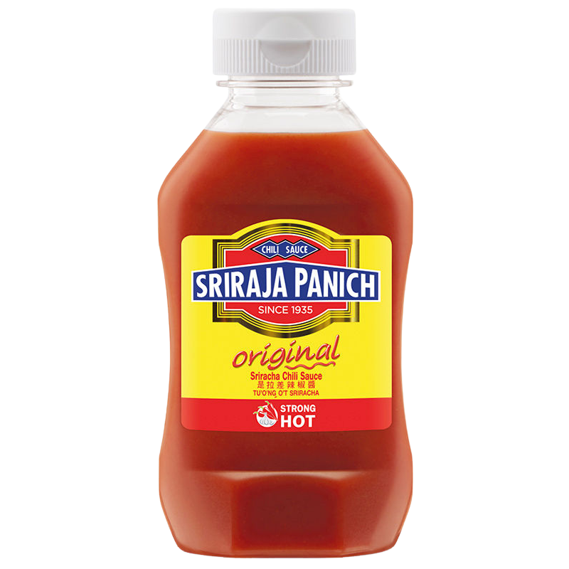 Sriracha chili sauce in a squeeze bottle, bright red condiment with green cap, ideal for adding spicy flavor to dishes