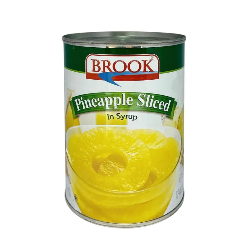 Dry grocery image of Brook Pineapple Slices in 567g package, showing golden dried pineapple slices from the BROOK brand.