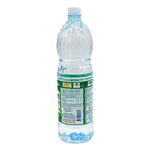 RUAMROS artificial vinegar bottle, 1.5L, in dry grocery section, showing clear plastic container with vinegar inside.