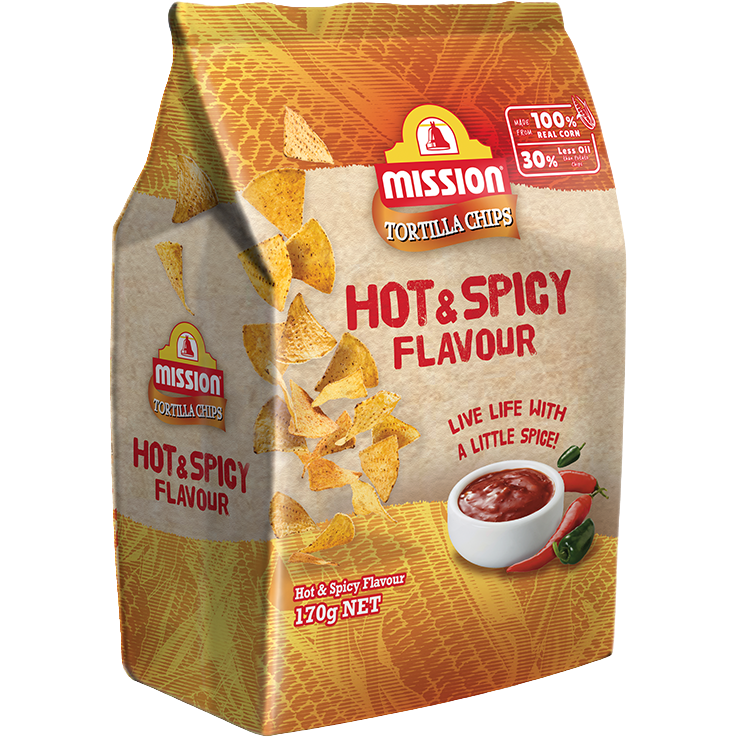 Mission Hot & Spicy Tortilla Chips in a bowl, showcasing their crispy texture and vibrant red seasoning.