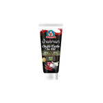Deksomboon Chilli Paste in Oil 85g jar, a spicy Thai condiment with red chili paste and oil in a clear container.