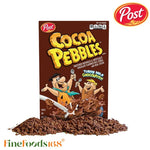 Post Cocoa Pebbles cereal box, 311g, dry grocery product with colorful cereal flakes featuring chocolate and cocoa flavors.