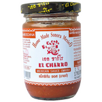 El Charro Mexican Mild Sauce bottle with label, showcasing traditional Mexican grocery product on a white background.