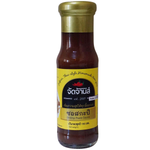 Jadjans Shrimp Sauce in a jar, showcasing the label and sauce texture, perfect for adding flavor to dishes.