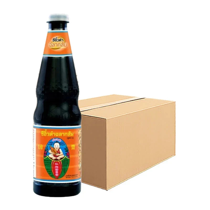 Deksomboon Black Soy Sauce 940g bottle, part of a 12-pack, shown in clear view, suitable for cooking and seasoning in dry grocery.