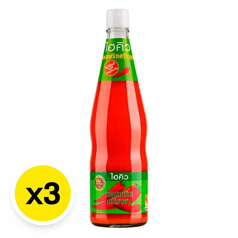 Three bottles of HI-Q Siracha chili sauce, 670g each, with bright red labels and chili peppers visible on the packaging.