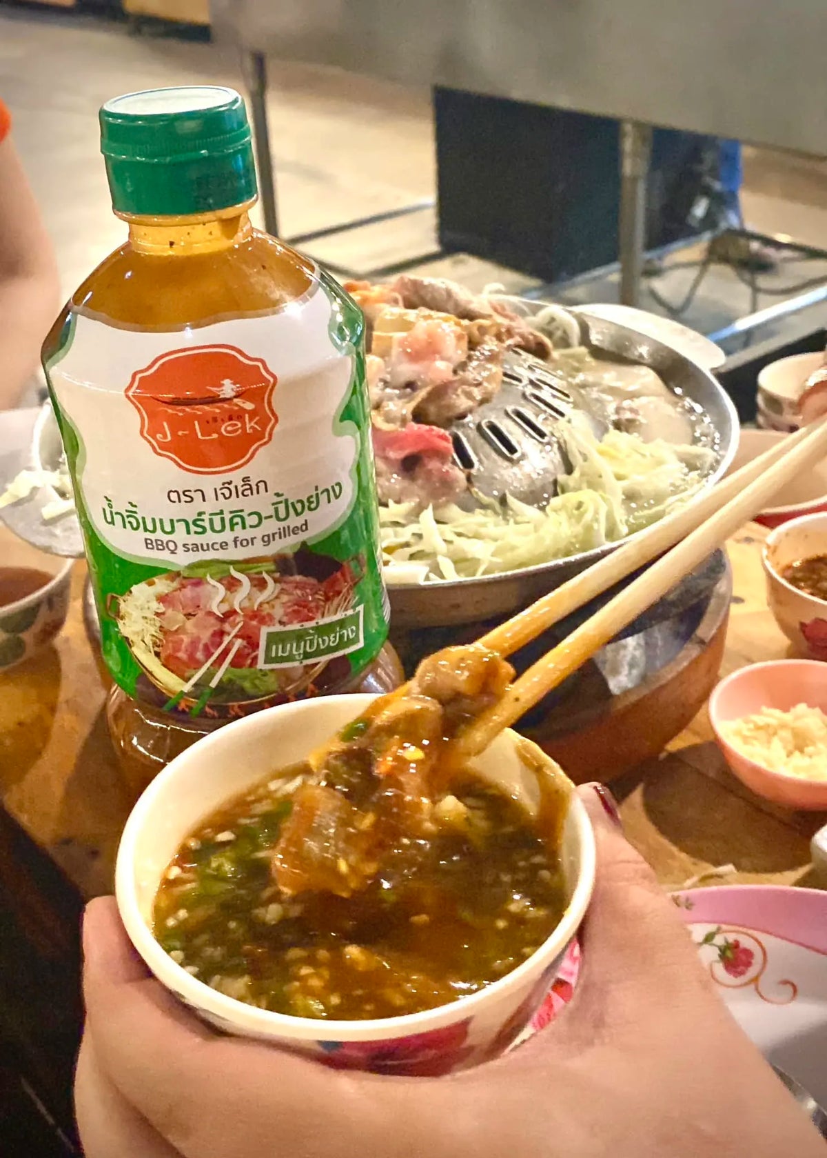 J-LEK BBQ grilling sauce bottles, 1000g, with flavorful sauce visible in clear plastic bottles for dry grocery use.