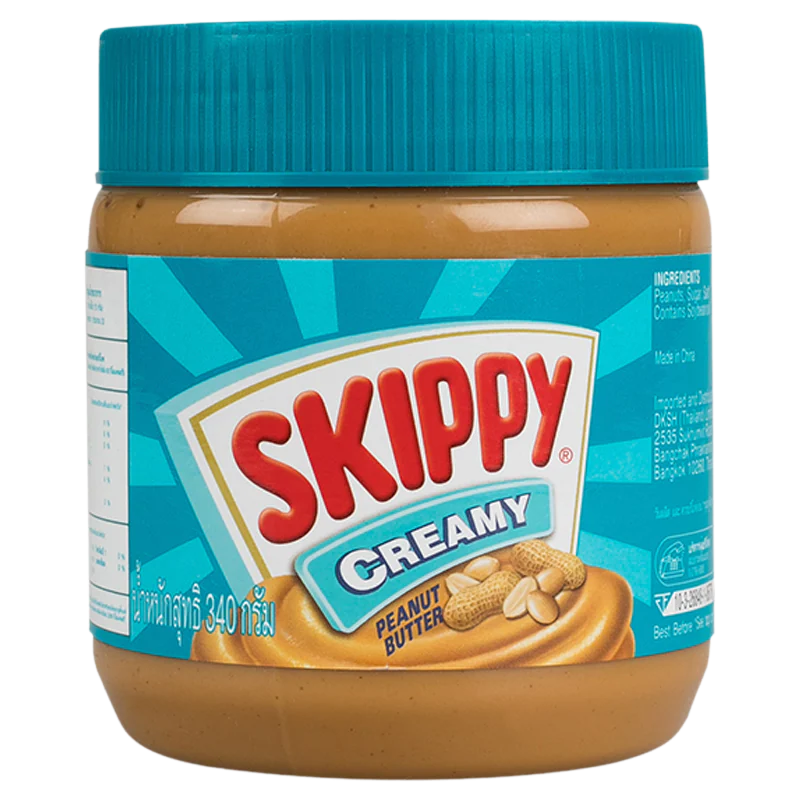 Creamy Skippy Peanut Butter jar shown with smooth texture and label, ideal for spreading on bread or snacks.