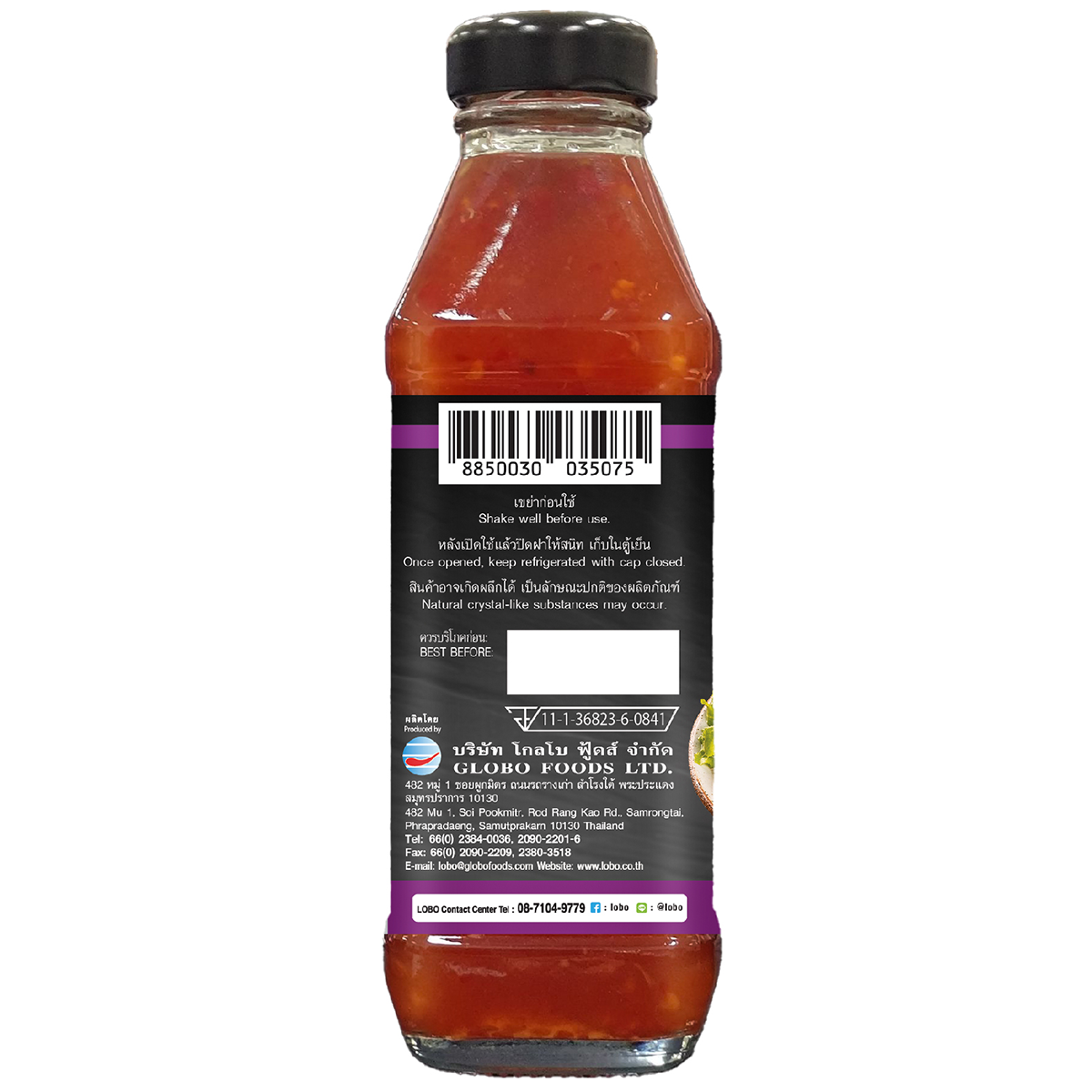 Lobo Thai spicy salad dressing bottle with a label, featuring a vibrant red and green design for all-purpose salad use.