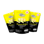 Rise Buddy Crispy Rice Snacks in a clear bowl, showing golden, crispy rice treats from the dry grocery snack brand.