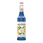 Bottle of MONIN Blue Curacao Syrup in 700ml size, featuring vibrant blue color and clear label for use in cocktails and beverages.
