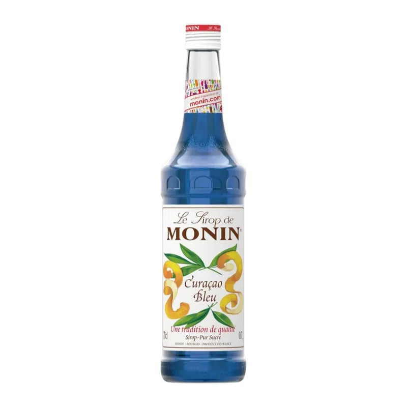 Bottle of MONIN Blue Curacao Syrup in 700ml size, featuring vibrant blue color and clear label for use in cocktails and beverages.