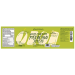 Paweenee's White Chocolate Pistachio grocery product, showcasing creamy white chocolate with pistachio nuts visible.
