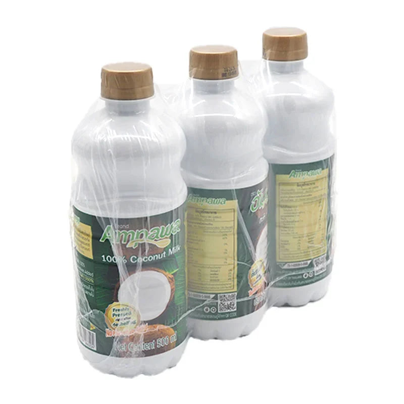 Three 500ml bottles of AMPAWA Ampawa Coconut Milk in PET bottles, part of dry grocery products.