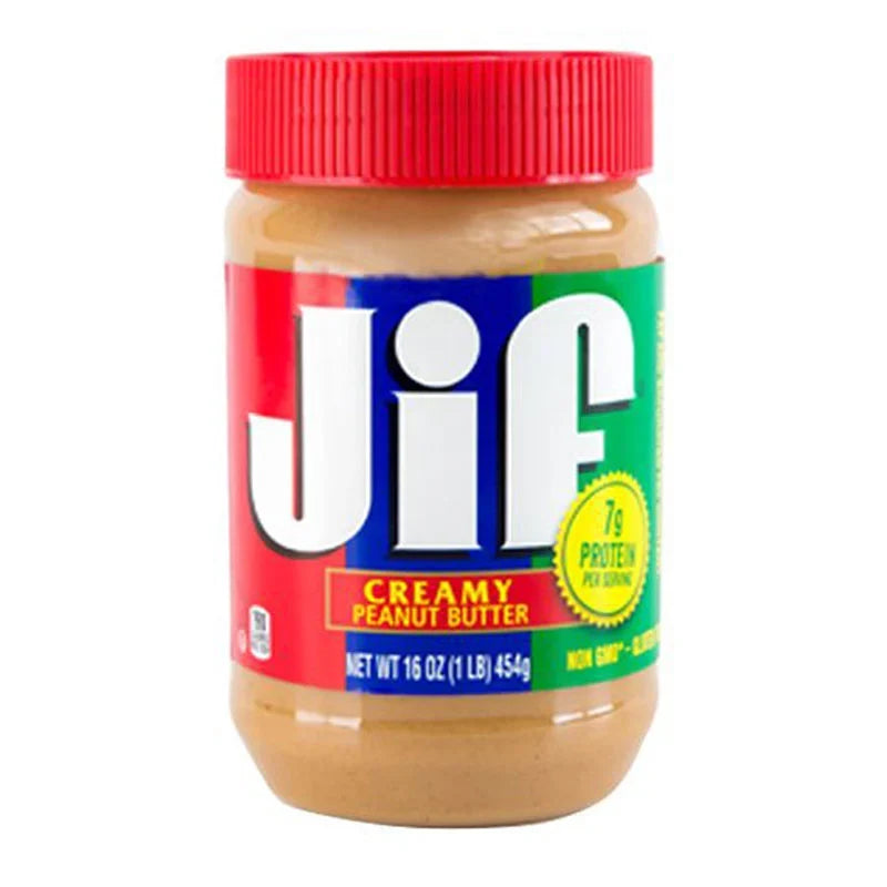 Creamy JIF peanut butter jar with label, 454g, in a clear glass jar, showing the JIF brand and smooth peanut butter inside.