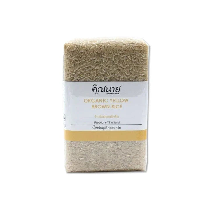 Organic yellow brown Khunnai Rice 1kg in a clear bag, showcasing the dry, unprocessed rice grains from KHUNNAI RICE brand.