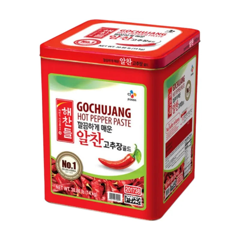 Haechandle Gochujang Korean chili sauce in 14kg dry grocery package, showing the vibrant red paste in a container.