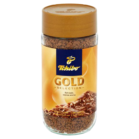 Tchibo Gold Selection instant coffee drink in a cup with a spoon, showcasing rich, aromatic coffee from the Tchibo brand.