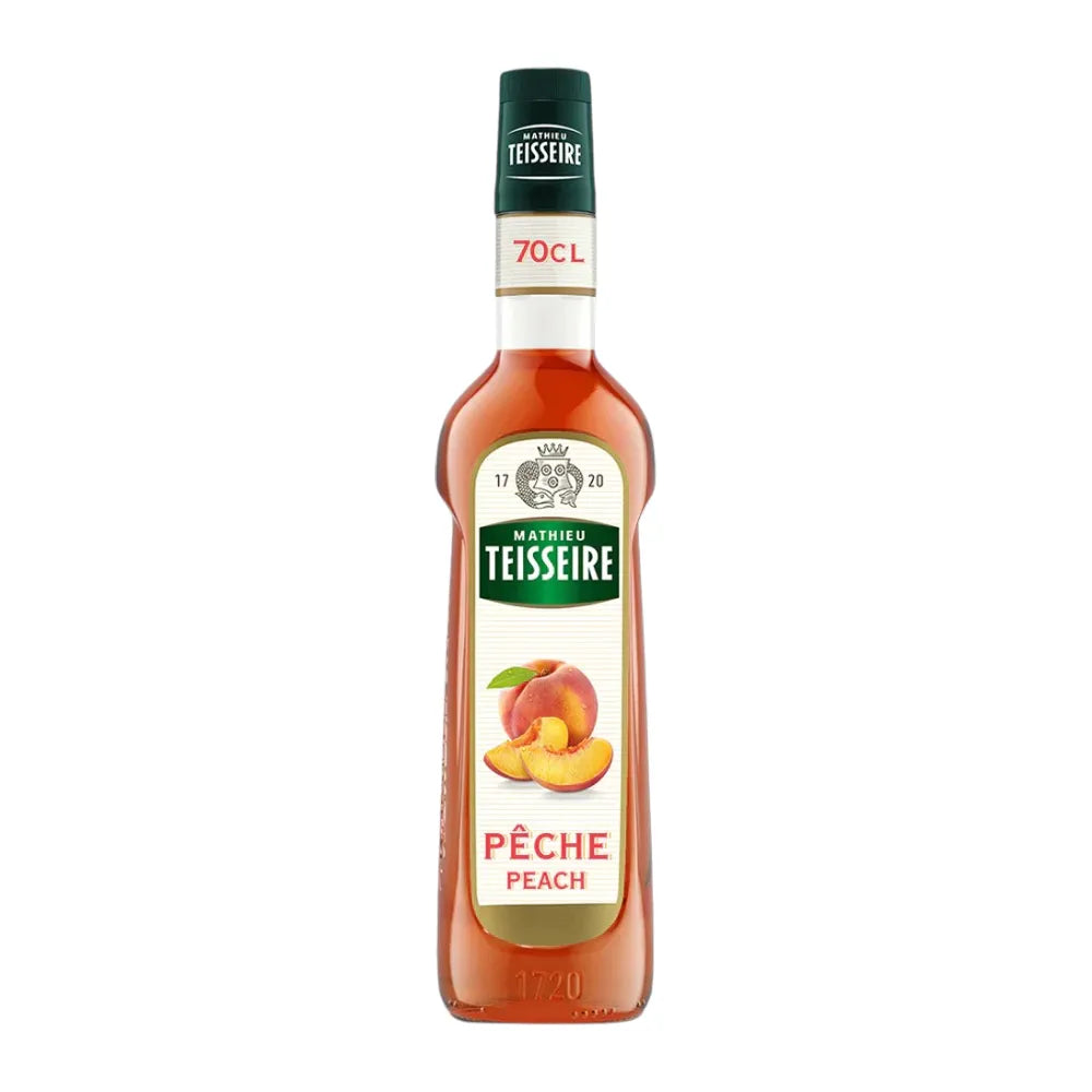 Mathieu Teisseire Peach Syrup 700ml bottle, ideal for beverages and desserts, in clear plastic container with label.