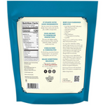 Organic All Purpose Flour from Bob's Red Mill's, shown in a bag with a scoop on a wooden surface.