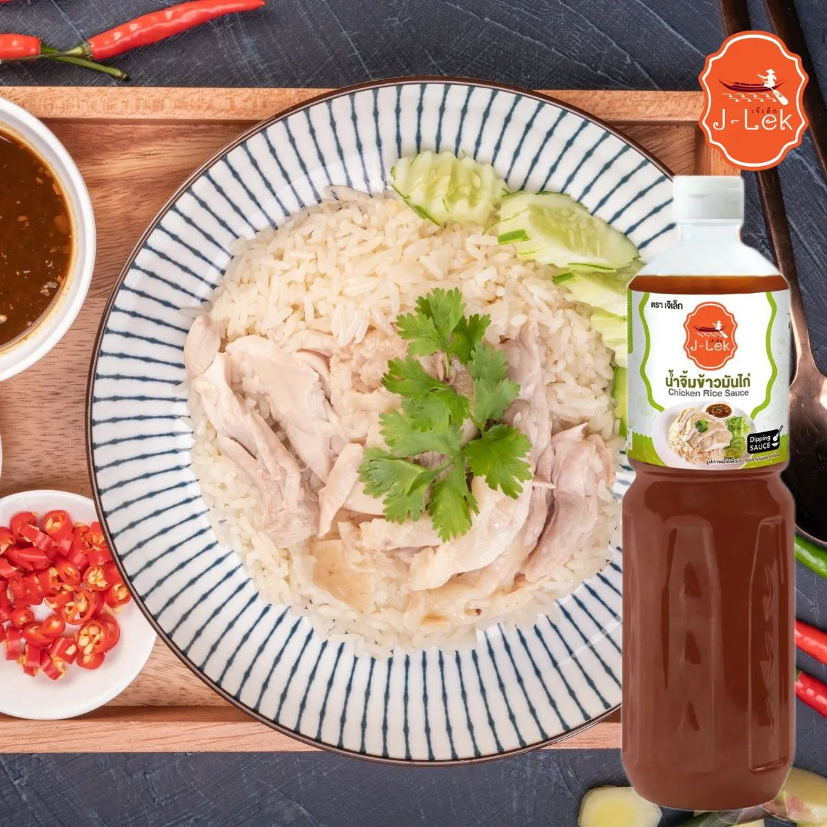 J-LEK Chicken Rice Sauce 560g jar, showcasing the dry grocery product with the label and lid visible.